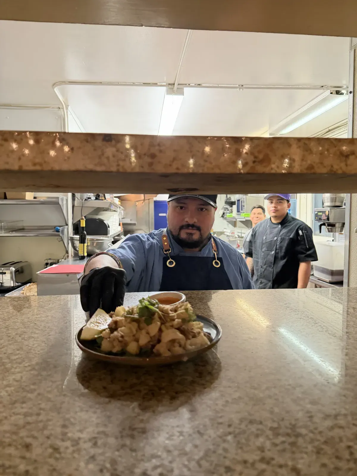 Executive Chef Hiram Diaz in the restaurant kitchen